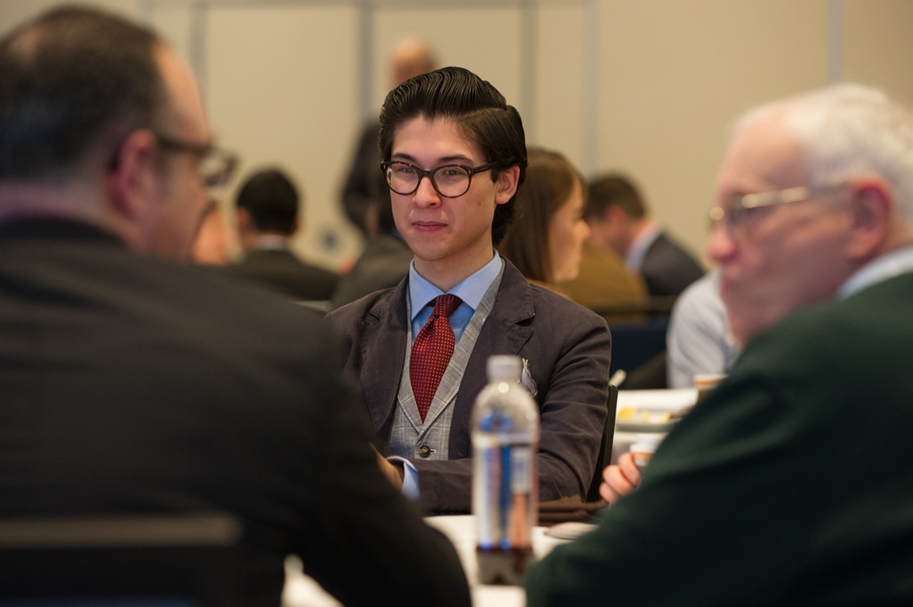 Young person speaking with adults to receive support