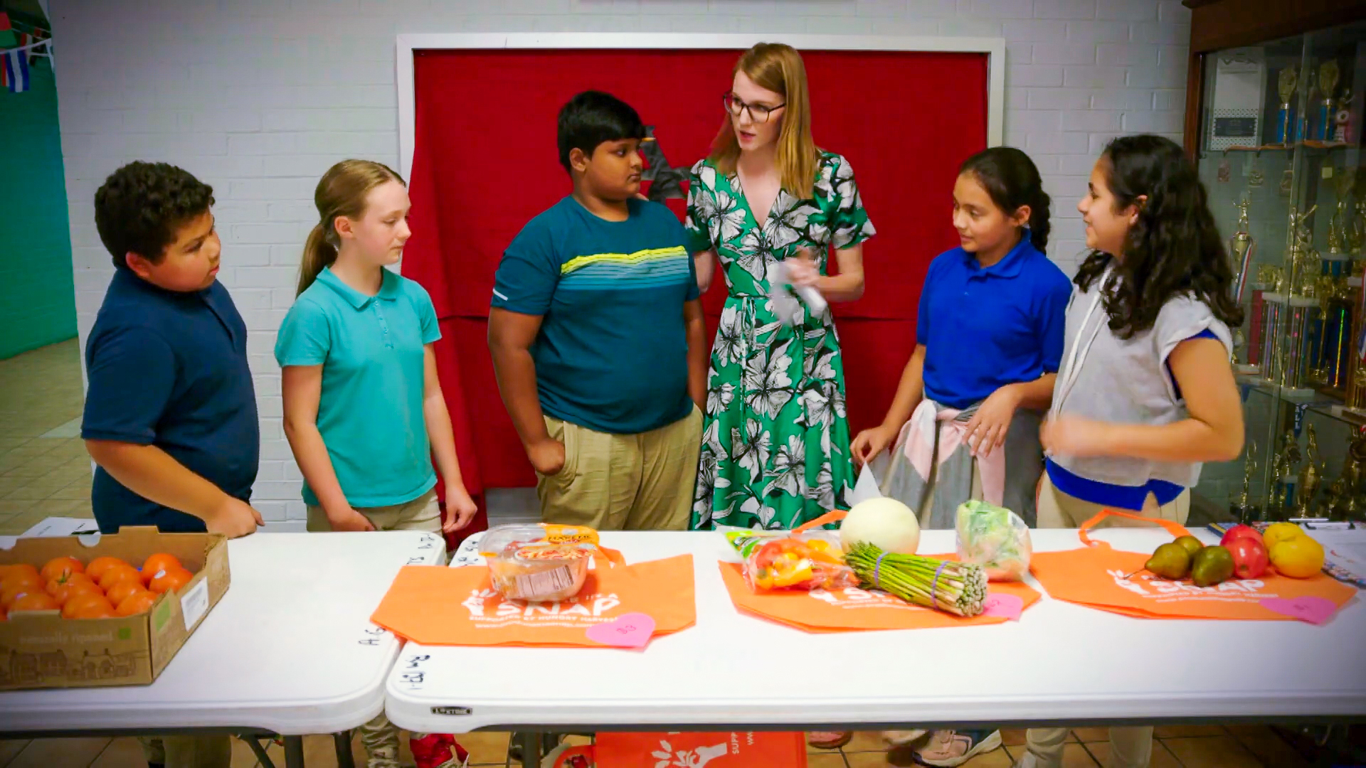 YMCA faculty mentoring a group of students