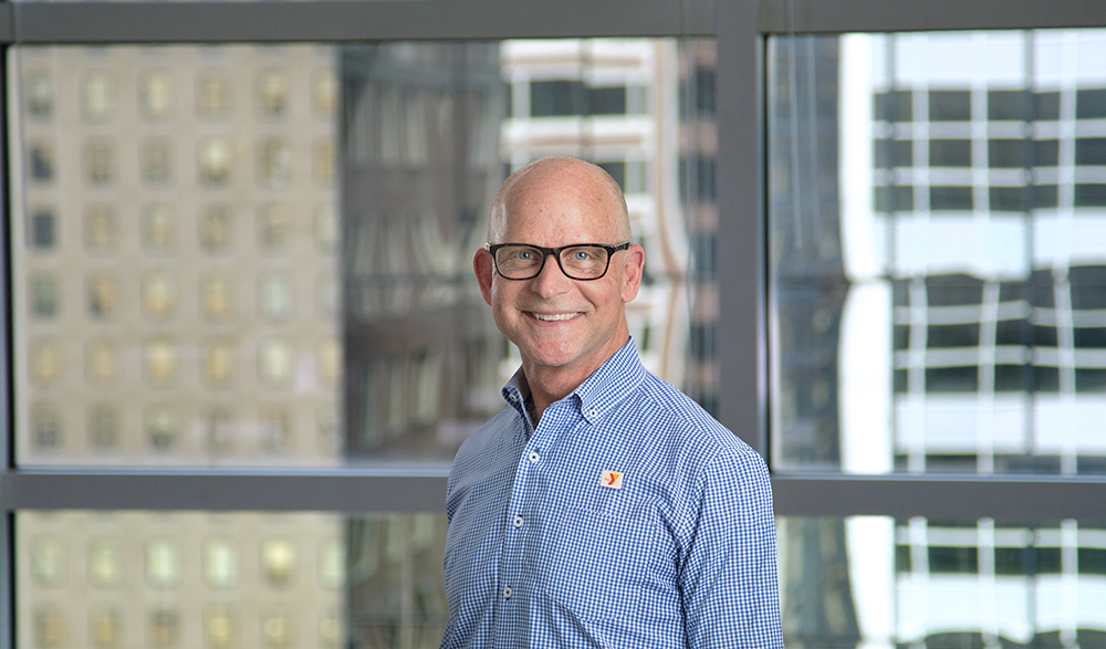 Headshot of Tom Gardner