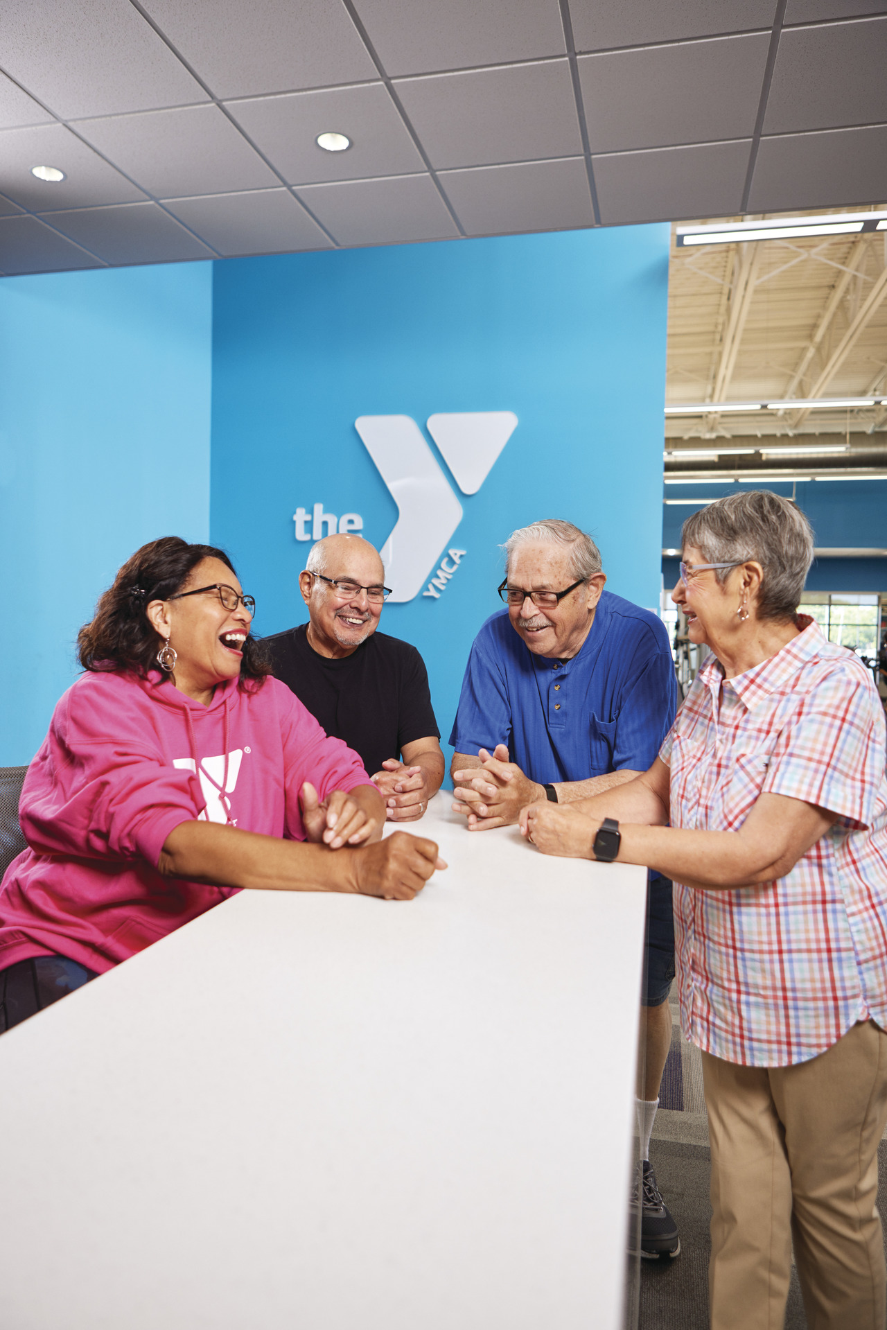 4 seniors socializing 