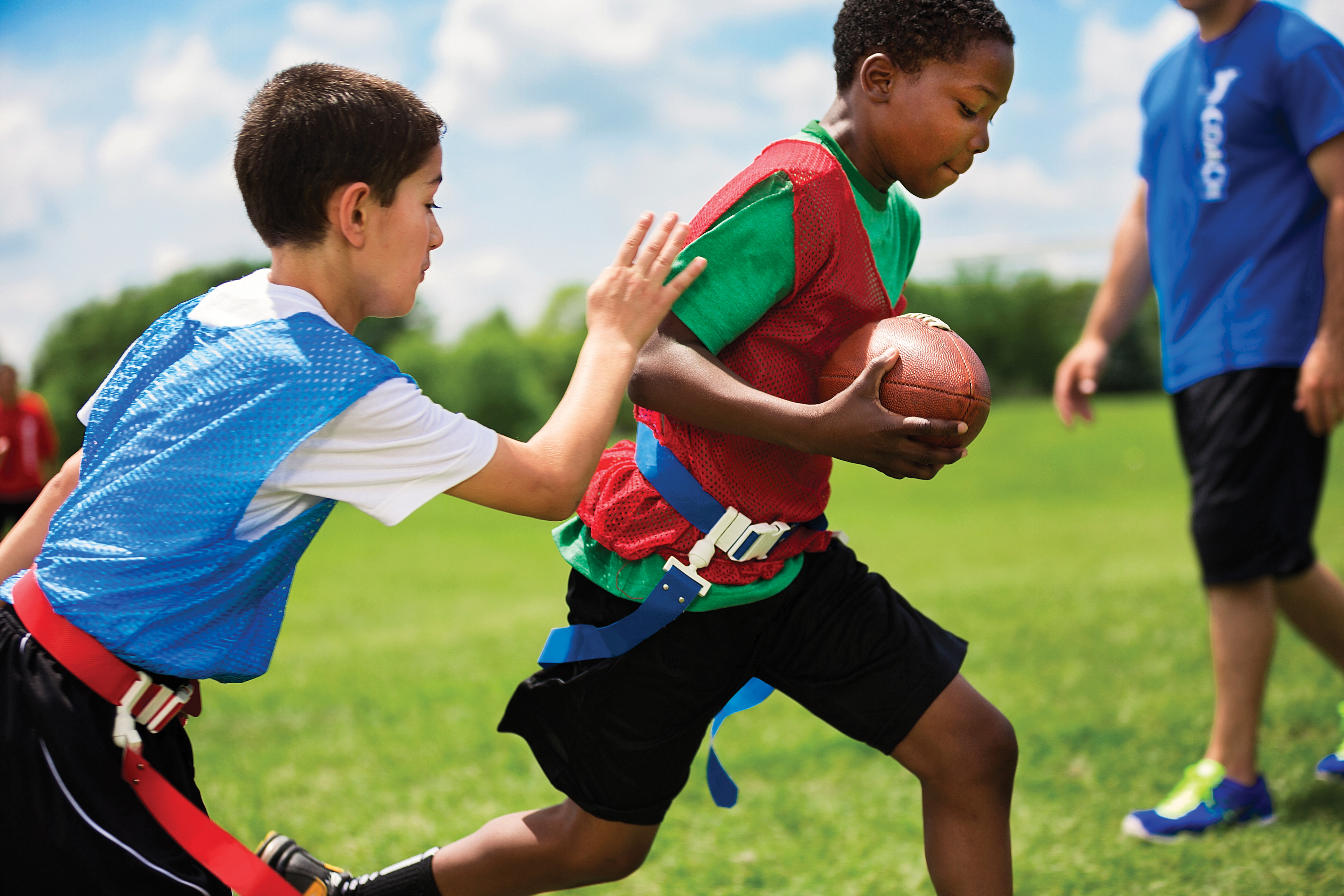 Boy playing flag football