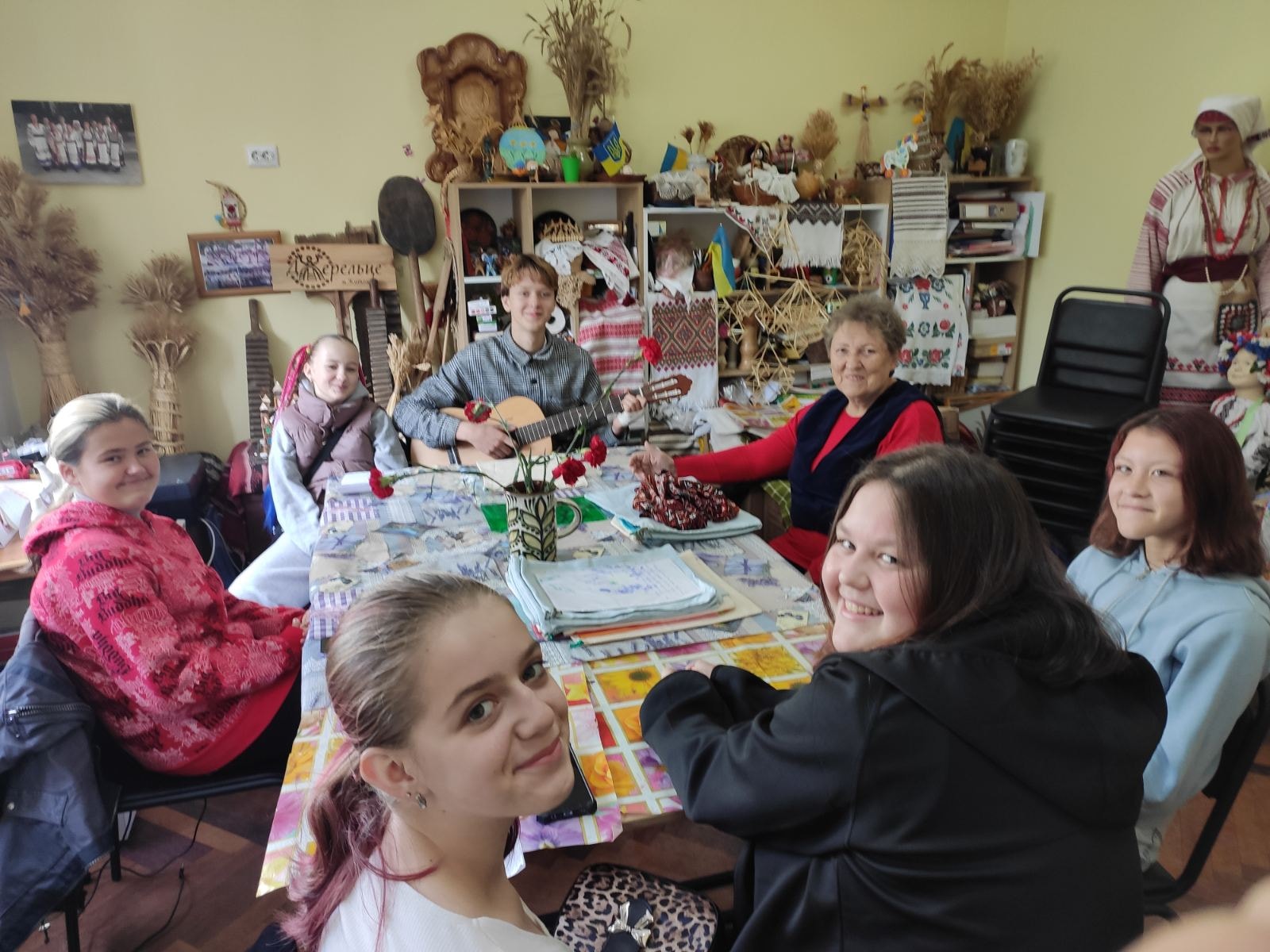 Intergenerational fellowship at a local YMCA club meeting in Ukraine.