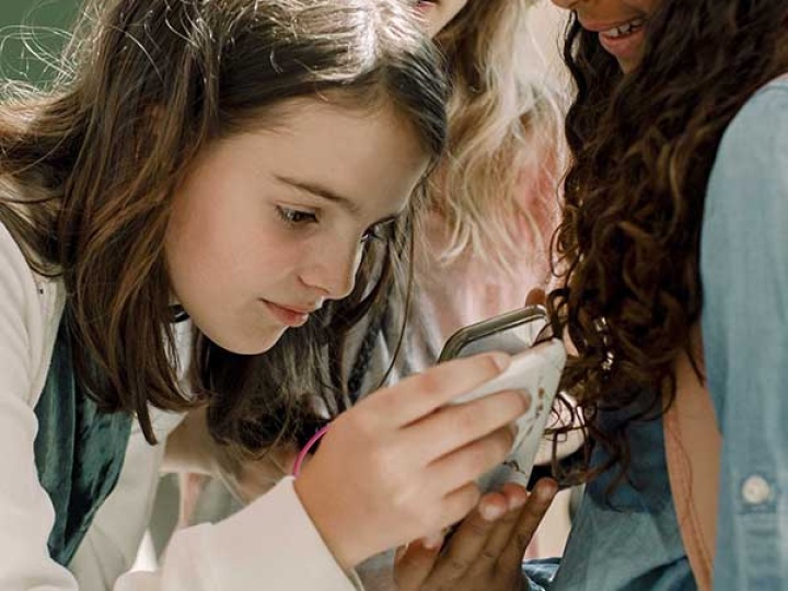 Girls looking at phone