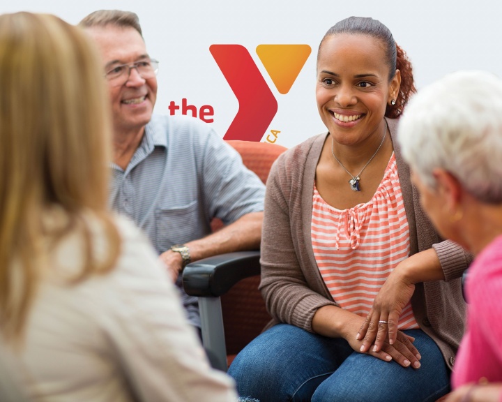Four adults socializing together at YMCA