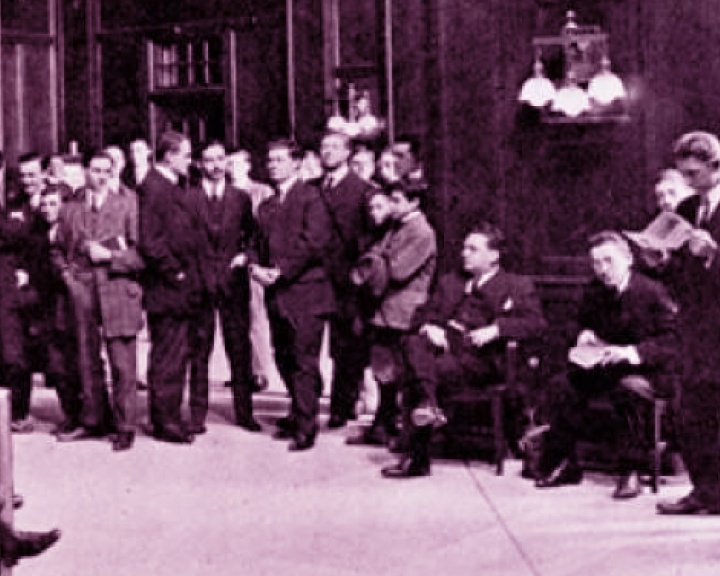 Members sit in large room in the 1800's