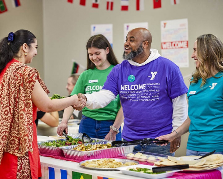 YMCA Staff Welcoming Member 