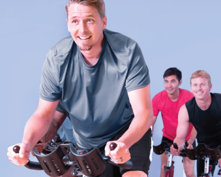 Man in a cycing class